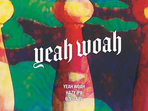 Colorful beer bottle label with 'yeah woah' branding and text.